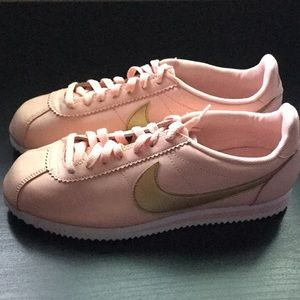 Pink and gold Nike Cortez